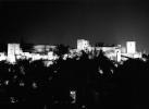 Alhambra, Granada, june 1999. Rolleiflex 3.5 B, Ilford XP2. Taken from same location as previously. Post-dinner version. Those aren't stars in the sky, by the way. It's dust on the negative! Try as you might, it's simply unavoidable.
